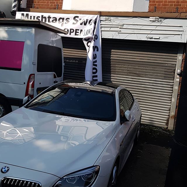 Putting up this 18 foot wide PVC banner. I Only whish the BMW wasn't in the way. Nice car though

To place your order whatsapp me: Mak of Big Print Birmingham on 07702153393