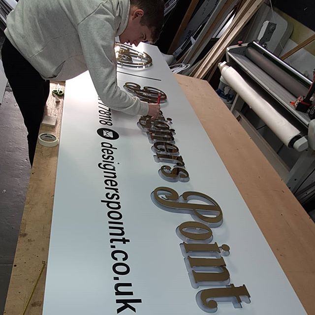 Owen fixing the mirror gold flat cut raised letters to the signboard.

To place an order If at all possible PLEASE whatsapp me on 07702153393