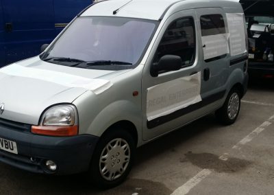 Sign being applied to passenger side door