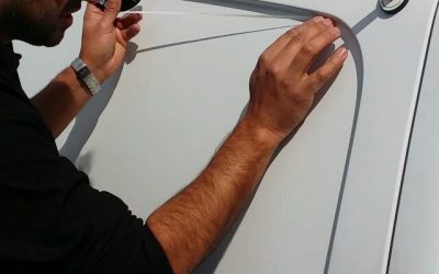 Applying knifeless tape to a van panel. This will allow us to cut the excess vinyl away leave a clean smooth finish. No need to use a bla…