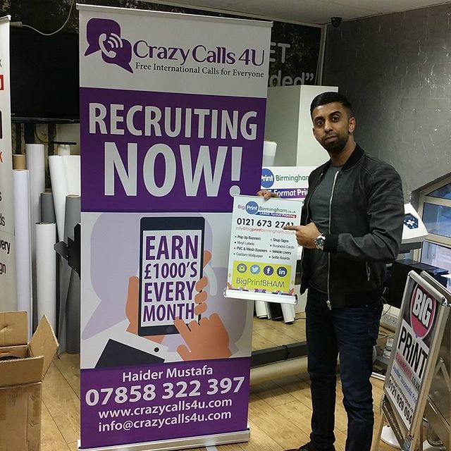 Client collecting a roller banner