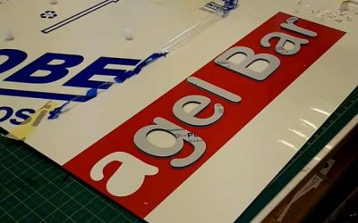 Placing of raised letters on a signboard. #bigprintbirmingham #printingbirmingham #signmaker #signs #birmingham #windowart #printshop #signshop