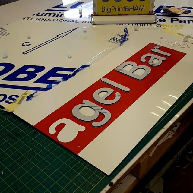 Placing of raised letters on a signboard. #bigprintbirmingham #printingbirmingham #signmaker #signs #birmingham #windowart #printshop #signshop