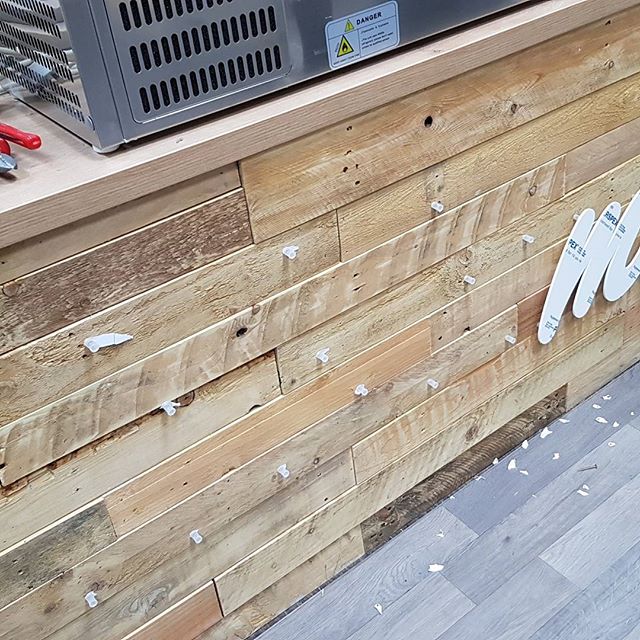 Applying flat cut raised letters to the locators. #bigprintbirmingham #printingbirmingham #signmaker #signs #birmingham #windowart #printshop #signshop #raisedletters #redditch #kingfishershopping #jacketpotato