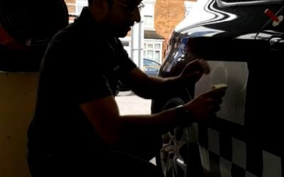 Removing the backing tape from cat livery#carlivery #carstickers #decals #car #signs