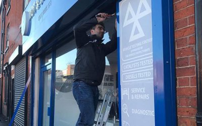 Applying signs to this mot shop.To place your order whatsapp me: Mak of Big Print Birmingham on 07702153393Or use this whatsapp link from your mobile:https://wa.me/447702153393#bigprintbirmingham#printingbirmingham #printshop#shopsigns#largeformatprinting#posters#cards #shopsigns