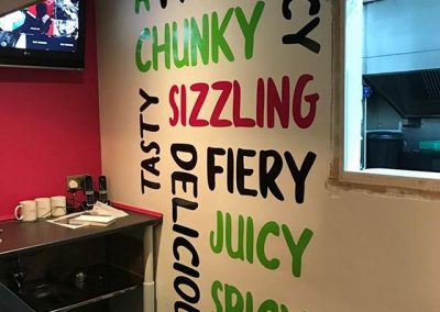 wall vinyls being applied to @chopandwok to place your order whatsapp me mak of big print birmingham 10