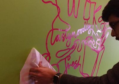 wall vinyls being applied to @chopandwok to place your order whatsapp me mak of big print birmingham 2