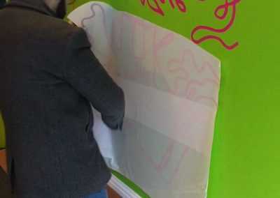 wall vinyls being applied to @chopandwok to place your order whatsapp me mak of big print birmingham 8