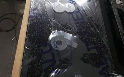 Flat cut letters applied to the backing boards. To place your order whatsapp me: Mak of Big Print Birmingham on 07702153393