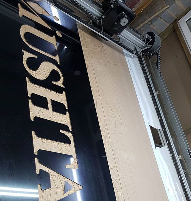 Cutting Mushtaqs new sign board. To place your order whatsapp me: Mak of Big Print Birmingham on 07702153393