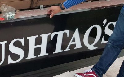 Fitting Mushtaqs sign board. To place your order whatsapp me: Mak of Big Print Birmingham on 07702153393
